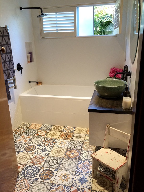 Patterned floor tile in a bathroom
