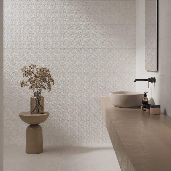 Vinci White decorative tile installed on bathroom wall